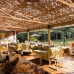 The Deck at Hemingways Eden Residence, overlooking the Giraffe Sanctuary Forest in Nairobi